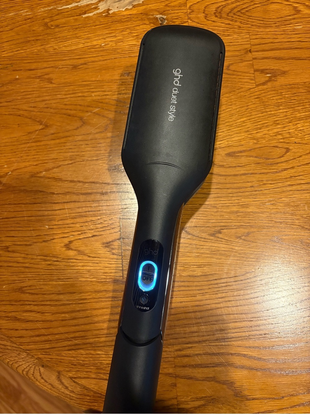 ghd black paddle straightener with blue LED